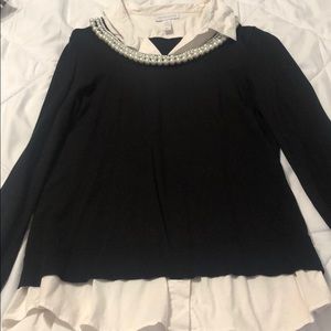 Black sweater with dress shirt tail